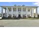 Stately clubhouse exterior with classic architecture and well-maintained landscaping at 780 Birkdale Dr, Fayetteville, GA 30215