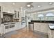 Traditional style kitchen featuring stainless steel appliances, granite countertops, and terracotta flooring at 780 Birkdale Dr, Fayetteville, GA 30215