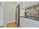 Kitchen with stainless steel fridge and granite counters providing ample storage and modern amenities at 780 Birkdale Dr, Fayetteville, GA 30215