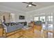 Open-concept living room featuring a foosball table and views into other living spaces at 780 Birkdale Dr, Fayetteville, GA 30215