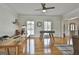 Spacious living area featuring a foosball table, and large windows providing lots of natural light at 780 Birkdale Dr, Fayetteville, GA 30215
