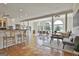 Spacious living room featuring terra cotta flooring and oversized windows with great outdoor views at 780 Birkdale Dr, Fayetteville, GA 30215