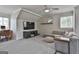 Lofted living room with cozy seating, entertainment center and an office nook at 780 Birkdale Dr, Fayetteville, GA 30215