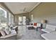 The covered patio features ample seating and views of the outdoors, perfect for relaxation and entertaining at 780 Birkdale Dr, Fayetteville, GA 30215