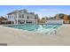 Community pool with clear blue water and a spacious sunbathing deck at 780 Birkdale Dr, Fayetteville, GA 30215