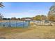 Community amenities featuring tennis courts, a playground, and green space at 780 Birkdale Dr, Fayetteville, GA 30215