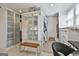 Custom walk-in closet with plenty of hanging and storage space, including mirrored cabinets and shelves at 780 Birkdale Dr, Fayetteville, GA 30215