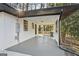 Spacious back porch with ample seating area, perfect for outdoor relaxation and entertainment at 1120 Starline Dr, Smyrna, GA 30080