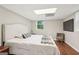 Cozy bedroom with hardwood floors, a comfortable bed, and neutral tones at 1120 Starline Dr, Smyrna, GA 30080