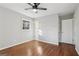 Bedroom featuring hardwood floors, white walls, and natural lighting at 1120 Starline Dr, Smyrna, GA 30080