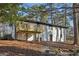 Backyard view showing the home's deck and landscaping at 1120 Starline Dr, Smyrna, GA 30080