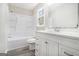 Bathroom features tub and shower combination, white vanity, and updated faucet at 20 King Pl, Stockbridge, GA 30281