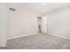 Bedroom featuring neutral carpet and large window at 20 King Pl, Stockbridge, GA 30281