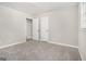 Bedroom featuring neutral carpet, and white trim at 20 King Pl, Stockbridge, GA 30281