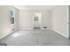 Neutral carpeted bedroom leading to an ensuite bath at 20 King Pl, Stockbridge, GA 30281