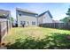 Expansive backyard with lush grass and wooden fence at 386 Hill Crest Cir, Hiram, GA 30141