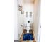 Clean half-bathroom with tile floors and decorative wall art at 386 Hill Crest Cir, Hiram, GA 30141