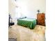 Bedroom with a green bedspread and neutral walls providing a calming atmosphere at 386 Hill Crest Cir, Hiram, GA 30141