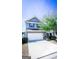 Charming two-story home featuring a two-car garage and well-maintained landscaping at 386 Hill Crest Cir, Hiram, GA 30141