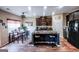 Modern eat-in kitchen featuring a center island with seating and stainless steel appliances at 386 Hill Crest Cir, Hiram, GA 30141