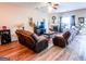 Spacious living room featuring a fireplace, hardwood floors, and comfortable seating at 386 Hill Crest Cir, Hiram, GA 30141