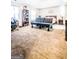 Spacious main bedroom featuring a tray ceiling and comfortable seating area at 386 Hill Crest Cir, Hiram, GA 30141