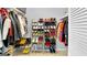 Organized walk-in closet with shelves and hanging racks, providing ample storage space at 93 Rue Fontaine, Lithonia, GA 30038