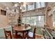 Bright dining area with a large window and decorative shelves at 4735 Rabbit Farm Rd, Loganville, GA 30052
