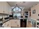 Spacious kitchen featuring granite countertops and a window view at 4735 Rabbit Farm Rd, Loganville, GA 30052