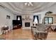 Cozy living room featuring a fireplace, hardwood floors, and neutral décor at 4735 Rabbit Farm Rd, Loganville, GA 30052