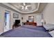 A primary bedroom featuring hardwood floors, ceiling fan and ensuite bathroom at 4735 Rabbit Farm Rd, Loganville, GA 30052