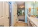 Bright bathroom with walk-in shower, jacuzzi tub, and vanity sink at 335 Jeff Davis Pl, Fayetteville, GA 30214