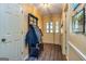 Hallway with a coat rack and wood floors at 335 Jeff Davis Pl, Fayetteville, GA 30214