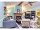 Inviting living room with a fireplace, comfortable seating, and stylish decor at 335 Jeff Davis Pl, Fayetteville, GA 30214