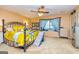 Spacious bedroom with seating area, ceiling fan, and neutral carpet at 335 Jeff Davis Pl, Fayetteville, GA 30214