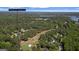 Aerial view of property, showcasing golf course, lake, and lush greenery in Villa Rica, GA at 4014 Golfview Dr, Villa Rica, GA 30180