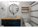 Charming bathroom with shiplap walls, wooden accents, and modern fixtures at 4014 Golfview Dr, Villa Rica, GA 30180