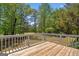 Scenic view from this wood deck shows the manicured green of the adjacent golf course at 4014 Golfview Dr, Villa Rica, GA 30180