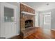 Close-up of the brick fireplace in the living room at 4014 Golfview Dr, Villa Rica, GA 30180