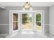Sun-filled dining area with bay window and view of the backyard at 4014 Golfview Dr, Villa Rica, GA 30180