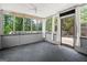 Relaxing sunroom with multiple windows and access to a deck at 4014 Golfview Dr, Villa Rica, GA 30180