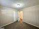 Neutral bedroom with closet, carpet, and open door at 2361 Collier Dr, Decatur, GA 30032