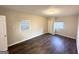 Cozy bedroom with neutral paint, modern floors, and natural light at 2361 Collier Dr, Decatur, GA 30032