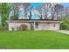 Charming single-story home featuring a well-maintained lawn and inviting front entrance at 2361 Collier Dr, Decatur, GA 30032