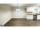 Well-lit kitchen dining area featuring modern cabinets and updated lighting at 2361 Collier Dr, Decatur, GA 30032