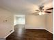 Spacious living room featuring sleek vinyl floors and a modern ceiling fan fixture at 2361 Collier Dr, Decatur, GA 30032