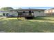 Backyard showing a small deck and a grassy lawn at 2818 Lynda Pl, Decatur, GA 30032