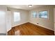 Bedroom featuring hardwood floors, natural light, and neutral paint at 2818 Lynda Pl, Decatur, GA 30032