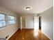 Spacious bedroom with hardwood floors, large windows, and access to an ensuite bathroom at 2818 Lynda Pl, Decatur, GA 30032