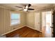 Comfortable bedroom features hardwood flooring and neutral painted walls at 2818 Lynda Pl, Decatur, GA 30032